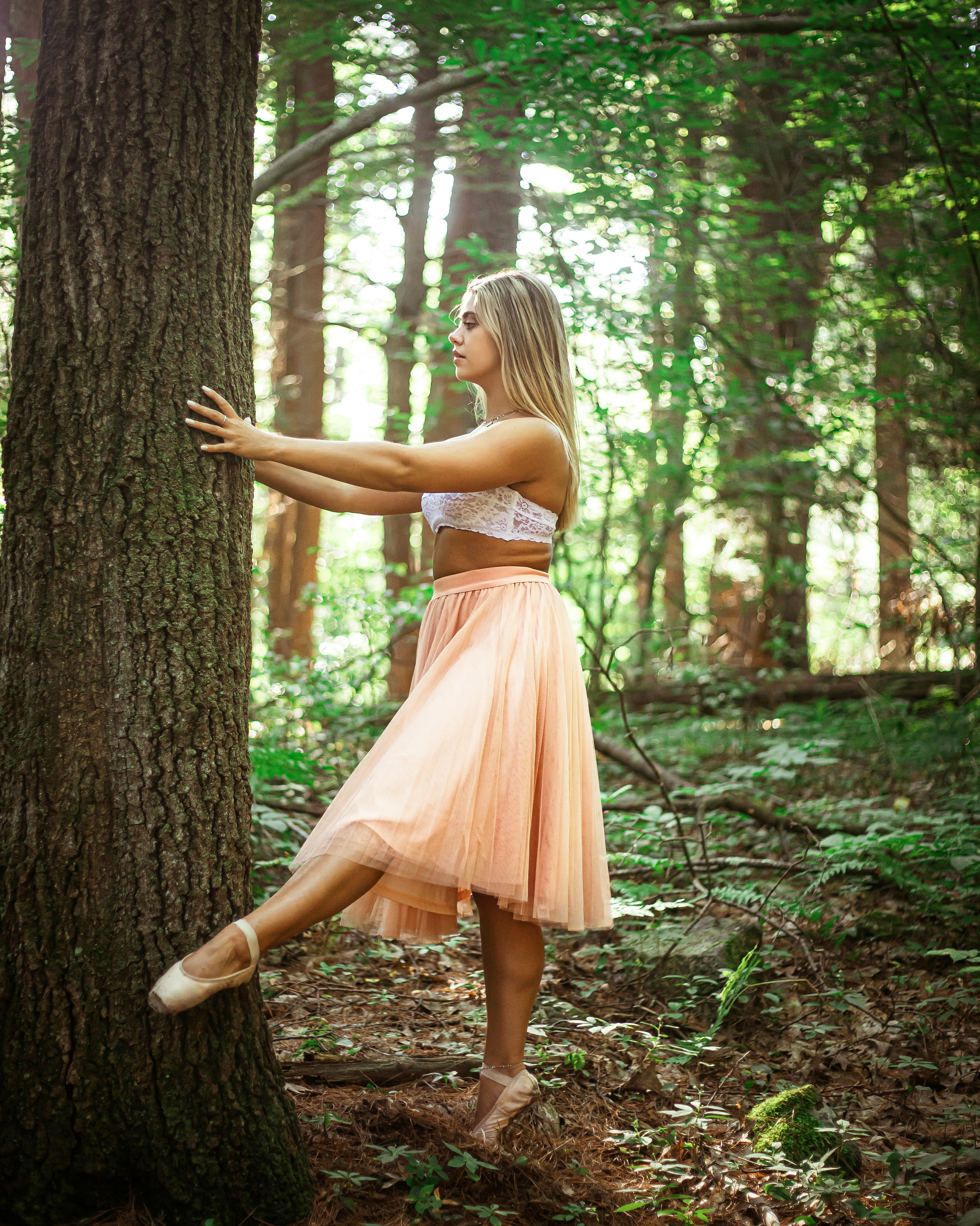 woman facing the tree